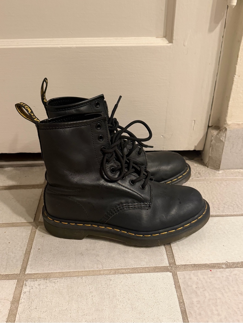 Dr. Martens Black Leather Combat Boots with Yellow Stitching